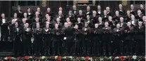  ?? PHOTO: LINDA ROBERTSON ?? Musical director Richard Madden conducts the Royal Dunedin Male Choir at a concert in the Dunedin Town Hall yesterday.