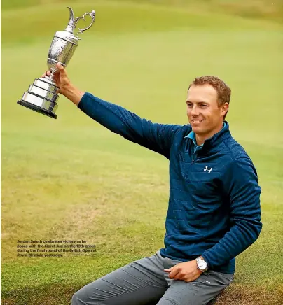  ?? GETTY IMAGES ?? Jordan Spieth celebrates victory as he poses with the Claret Jug on the 18th green during the final round of the British Open at Royal Birkdale yesterday.