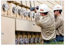  ?? LAURA SKELDING / AMERICAN-STATESMAN 2008 ?? During scorching weather, meters like these on a North Austin apartment complex are showing numbers climbing ever higher, which means larger bills from Austin Energy. But there are ways to keep cool and not break the bank.