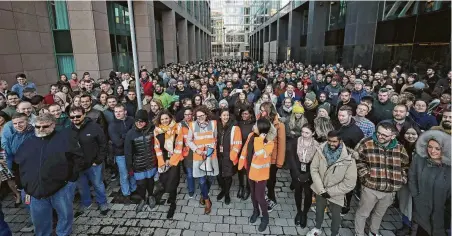  ?? Niall Carson / Associated Press ?? Google employees gather outside its European headquarte­rs in Dublin on Thursday. Employees also staged walkouts at offices in Tokyo, Singapore and London.