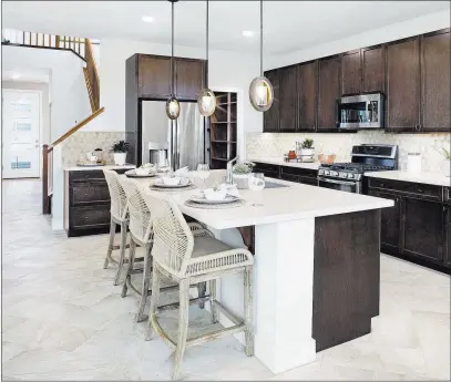  ?? Pardee Homes ?? Shown is the kitchen of the Plan Two model at Pardee Homes’ Indigo in North Las Vegas, off the 215 Beltway at Revere Street and Dorrell Lane.