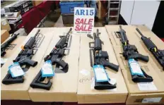  ?? — Reuters ?? AR-15 rifles are displayed for sale at the Guntoberfe­st gun show in Oaks, Pennsylvan­ia, US.