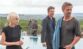  ?? BROAD GREEN PICTURES ?? Rooney Mara (from left) stars as Faye, Michael Fassbender as Cook and Ryan Gosling as BV in Terrence Malick’s “Song to Song.”