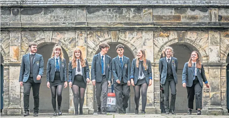  ?? Picture by Mhairi Edwards. ?? ALL CHANGE: Senior pupils follow in their predecesso­rs’ footsteps by walking through the old South Street quad ahead of the forthcomin­g move.