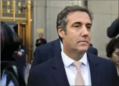  ??  ?? In this April 26 file photo, Michael Cohen leaves federal court in New York. President Donald Trump’s former personal lawyer secretly recorded Trump discussing payments to a former Playboy model who said she had an affair with him, The New York Times...