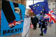  ?? AP/FRANK AUGSTEIN ?? People protesting Britain’s exit from the European Union gather earlier this week outside Parliament in London.