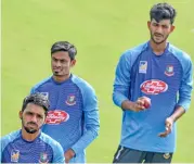  ??  ?? L-R: Mominul Haque, Taijul Islam and Nayeem Hasan at nets in Indore