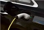  ??  ?? CHARGING Using a standard threepin mains plug at home, you can top up the A8’s batteries in around six hours. With a 7kW wallbox unit, that time will drop to two hours for a full charge