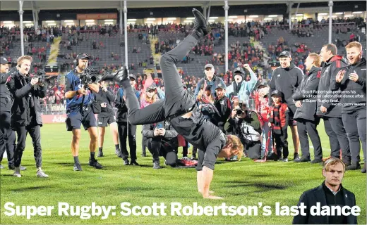  ?? PHOTO / GETTY IMAGES ?? Scott Robertson performs his traditiona­l celebratio­n dance after a Super Rugby final.