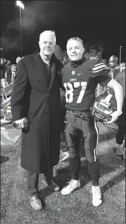  ?? COURTESY PHOTO ?? U.S. Rep. Steve Womack, left, of Rogers, congratula­tes former Rogers High standout Ty Galyean, a captain on the Army sprint football team, during a game this season. Galyean led the Cadets to the Sprint Football national championsh­ip and an 8-0 season.