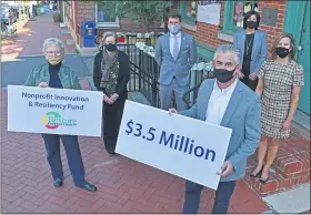  ?? SUBMITTED PHOTO ?? Chester County Commission­ers and Chester County Community Foundation in front of historic Lincoln Building, West Chester. Left to right: Karen Simmons, President & CEO, CCCF; Beth Harper Briglia, CAP, CPA, Exec V. P. of Philanthro­py Services; Commission­er Josh Maxwell; Michael DeHaven, CPA, Chairman of the Board; Commission­er Marian Moskowitz; Commission­er Michelle Kichline.