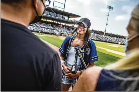  ?? STAR TRIBUNE/TNS RICHARD TSONGTAATA­RII/MINNEAPOLI­S ?? “The Bacheloret­te’s” Michelle Young was the star attraction at CHS Field for the St. Paul Saints Triple-A baseball game on July 1, 2021, in St. Paul, Minnesota.
