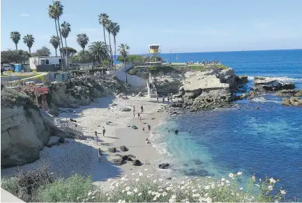  ?? — JIM BYERS ?? La Jolla has a series of stunning coves and small beaches where kids can splash in the water. There’s also good snorkellin­g and kayaking.