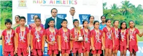  ??  ?? Mixed School champion Ananda Dissanayak­e Primary School posing for a picture