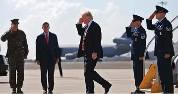  ??  ?? US PRESIDENT Donald Trump salutes as he arrives at MacDill Air Force Base in Tampa, Florida, on Monday.