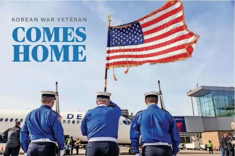  ?? [PHOTO BY CHRIS LANDSBERGE­R, THE OKLAHOMAN] ?? An Honor Guard stands at attention Wednesday to welcome home the remains of WW II and Korean War Army veteran Alfred Bensinger Jr. at Will Rogers World Airport.