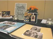  ?? SAMI EDGE/THE NEW MEXICAN ?? An altar for victims of opioids sits in the back of a conference room where state legislator­s, medical profession­als and advocates gathered Thursday for an Opioid Crisis Response Summit at the Santa Fe convention center.