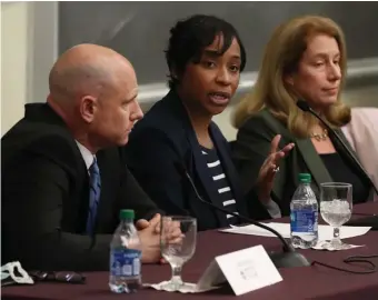  ?? NAncy lAnE / HErAld STAFF ?? CONTESTED: Attorney general candidate Andrea Campbell speaks, flanked by rivals Quentin Palfrey and Shannon Liss-Reardon, at a candidate forum Thursday at Boston College Law School in Newton.