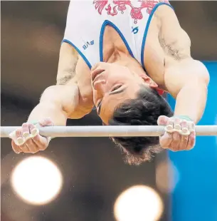  ?? VADIM GHIRDA THE ASSOCIATED PRESS ?? Russia’s Artur Dalaloyan, laid low by his critical error in the team final, won the men’s all-around gold medal at the Gymnastics World Chamionshi­ps on a tiebreaker on Wednesday.