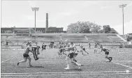  ?? CANADIAN PRESS FILE PHOTO ?? Members of the Wolfpack practice in Toronto last month. After starting in the third tier of English rugby league in 2017, Toronto is potentiall­y just seven games away from winning promotion to the elite Super League.