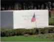  ?? ASSOCIATED PRESS ?? A small American flag waves at the head of the grave of Franklin Delano Roosevelt in 1997. The simple marble monument sits at the site of the graves of Franklin and Eleanor Roosevelt at the Roosevelt home, Springwood, in Hyde Park, N.Y.