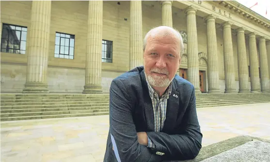  ??  ?? Vitaly Mironov, pictured left outside Dundee’s Caird Hall, is president of the Moscow Caledonian Club, which has organised a special train trip across Russia in tribute to Scottish explorer John Dundas Cochrane, above. Picture left: Dougie Nicolson.