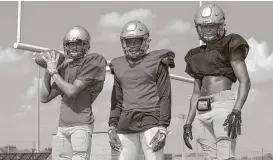  ?? Yi-Chin Lee / Houston Chronicle ?? Before all the flooding, Willowridg­e’s Vaughnte Frederick, from left, Christian Carter, and Daijuan Johnson had been displaced by mold issues at their school.