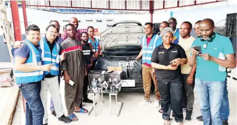  ?? ?? Director, Mijo Autogas Pvt Ltd, India, Gaurav Goyal ( left); Co- Founder, Fixit45, Pankaj Bohhra and other trainees during the recently concluded nationwide CNG Kits installati­on training programme for Nigerian technician­s.