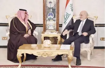  ??  ?? السفير السبهان في لقاء سابق مع وزير خارجية العراق إبراهيم الجعفري في بغداد. (أ ف ب)