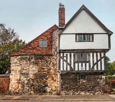  ??  ?? Faversham town guide Antony Millett.
The outer stone wall of Arden’s House is all that is left of the 13th century abbey gatehouse.