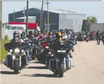  ?? GREG SOUTHAM ?? Hundreds of motorcycle riders take part in a memorial ride for Philip Mooney, 39, and Courtney Mooney, 37, on Saturday.