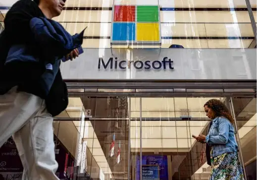  ?? YUKI IWAMURA/BLOOMBERG ?? Microsoft shares have gained around 15 percent since the end of September, making them the top performer among the seven Big Tech megacaps that have powered the market’s gain this year.