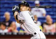  ?? ROB FOLDY / GETTY IMAGES ?? Ichiro Suzuki is one of the 31 players in the 3,000-hit club. Ichiro has 3,080 hits in the majors and another 1,278 in nine seasons in Japan.