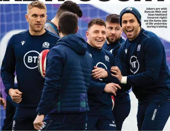  ??  ?? Jokers are wild: Duncan Weir and Sean Maitland (nearest right) see the funny side of life yesterday during training