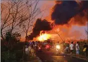  ?? PIC/PTI ?? Smoke billows from a fire at Baghjan oil field, a week after a blowout in Tinsukia district