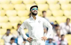  ?? — AFP photo ?? This file photo taken on November 27, 2017 shows Indian cricket team captain Virat Kohli reacting during the fourth day of the secondTest cricket match between India and Sri Lanka at the Vidarbha Cricket Associatio­n Stadium in Nagpur.