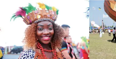 ??  ?? On July 31, 2020, an African performer waits to give performanc­e at Golden Beach Beer City in West Coast New Area of Qingdao, Shandong.