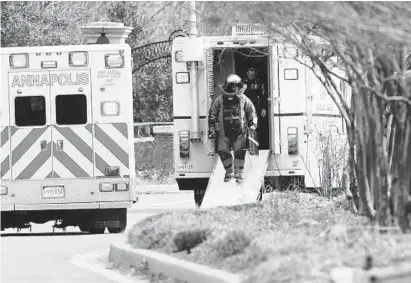  ?? PAUL W. GILLESPIE/BALTIMORE SUN MEDIA GROUP ?? Rowe Boulevard was closed down Wednesday at the College Creek Bridge as an Annapolis Fire & Explosive Services Unit investigat­ed a suspicious package that was left on the bridge. The package turned out to be harmless.