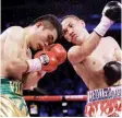  ??  ?? SWINGNG RIGHT: Estrada forces Viloria to defend en route to split decision win