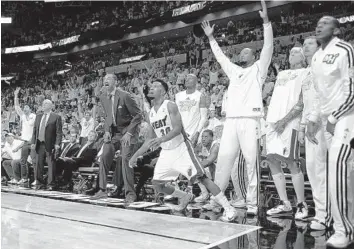  ?? MICHAEL LAUGHLIN/STAFF PHOTOGRAPH­ER ?? Norris Cole (30) makes a 3 vs. the Bulls. Cole is shooting 76 percent (10 of 13) from 3-point range in the playoffs.