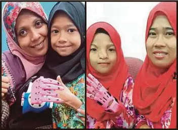  ??  ?? NUR FAQIHAH (kiri) dan Puteri Nurdini (kanan) menunjukka­n tangan 3D diterima mereka.