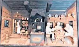  ?? COURTESY ?? This diorama, or shadowbox, provides a view of a French or German tavern from the 19th century.