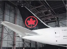  ?? MARK BLINCH THE CANADIAN PRESS ?? A consortium including Air Canada, TD Bank, CIBC and Visa Canada Corp. have reached a deal to acquire the Aeroplan loyalty program from Aimia Inc.