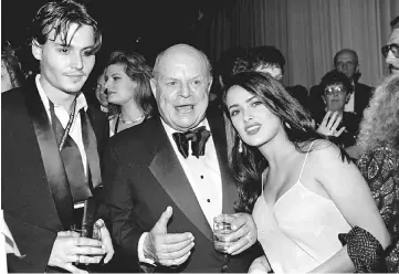  ?? — Reuters file photo ?? Actor Johnny Depp (left) joins comedian Rickles and actress Salma Hayek at the party following the taping of an ABC TV special ‘Sinatra: 80 Years My Way’ at the Shrine Auditorium on Nov 19, 1995.