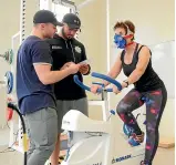  ?? MARY JAKSCH ?? Nelson Marlboroug­h Institute of Technology exercise students Ricky Silva and Isaiah Stevenson put Mary through her paces to gauge her baseline fitness.
