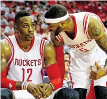  ?? MARTINEZ / GETTY IMAGES ?? Houston’s Dwight Howard (12) has been working all season to keep his teammates motivated, even when he was sidelined by an injury. RONALD