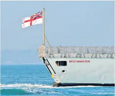  ?? ?? HMS Westminste­r, a Royal Navy Type 23 frigate, approachin­g Portsmouth Harbour