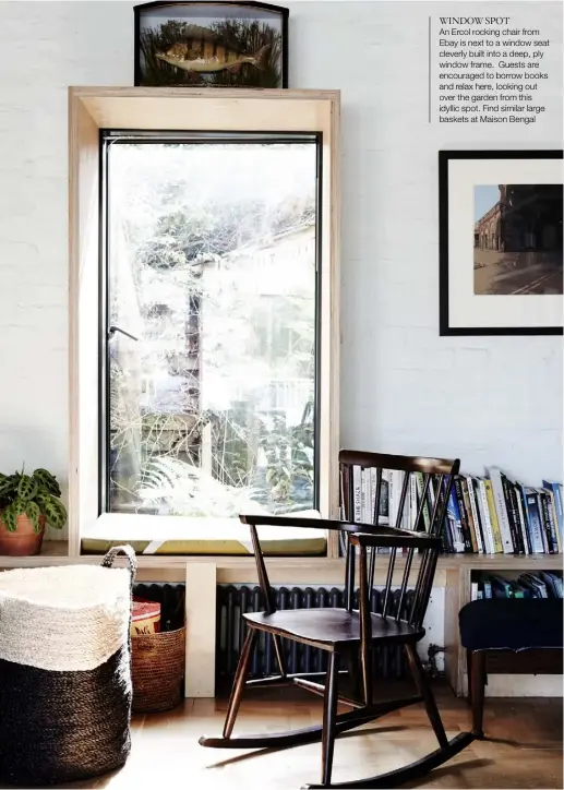  ??  ?? WINDOW SPOT
An Ercol rocking chair from Ebay is next to a window seat cleverly built into a deep, ply window frame. Guests are encouraged to borrow books and relax here, looking out over the garden from this idyllic spot. Find similar large baskets at Maison Bengal