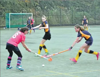  ??  ?? Susie Murchie drives the ball towards the goal as Hillhead try to thwart the advance.