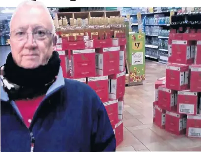  ??  ?? ●●David Clare (inset) expressed his outraged at two ‘dangerous’ wine crate displays